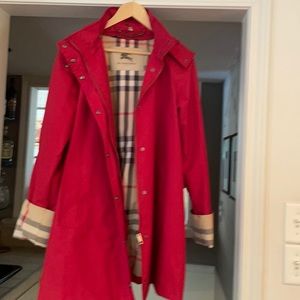 Burberry Rain Jacket with detachable hood. No stains or tears.